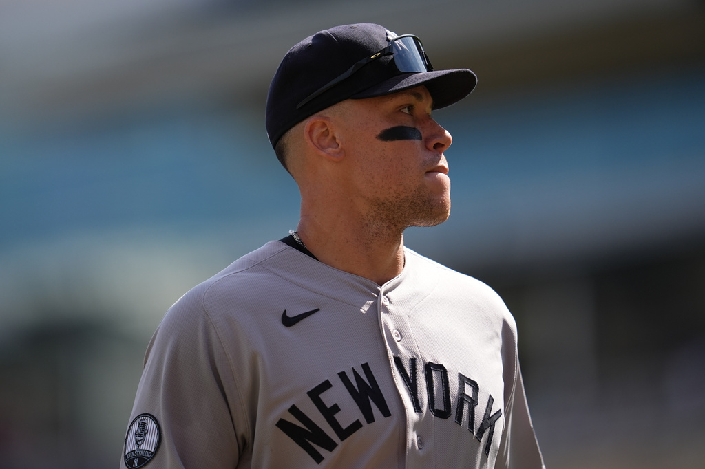 New York Yankees' Aaron Judge walks back to the dugout after the bottom of the fourth inning of a baseball game against the Minnesota Twins, Wednesday, Sept. 16, 2026, in Minneapolis. (AP Photo/Abbie Parr)