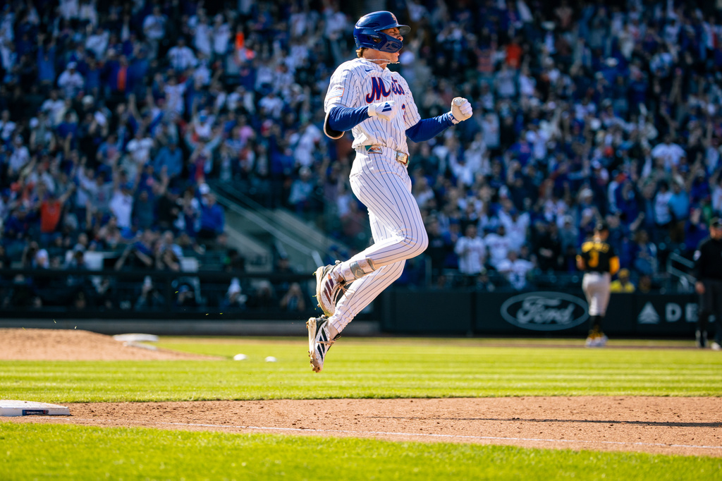 New York Mets' Carson Benge (3) celebrates after hitting a home run in the sixth inning of an opening-day baseball game against the Pittsburgh Pirates, Thursday, March 26, 2026, in New York. (AP Photo/Angelina Katsanis)