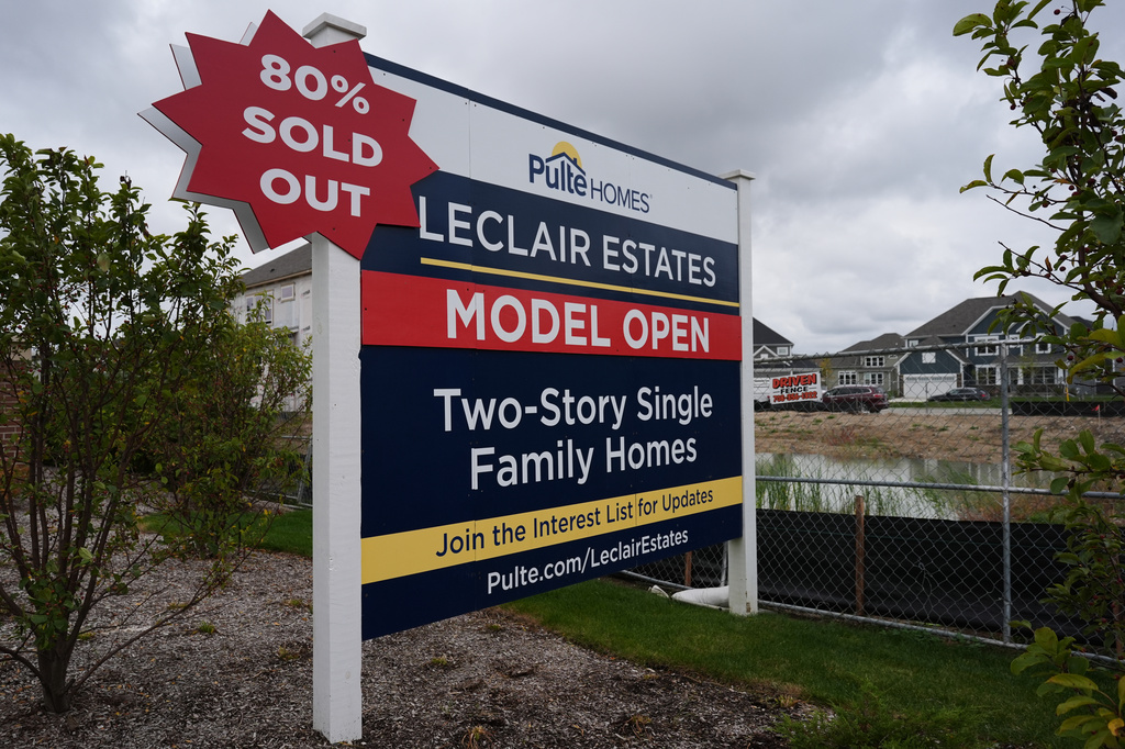 A sign stands in front of a new home construction site in Deerfield, Ill., Wednesday, Oct. 14, 2026. (AP Photo/Nam Y. Huh)