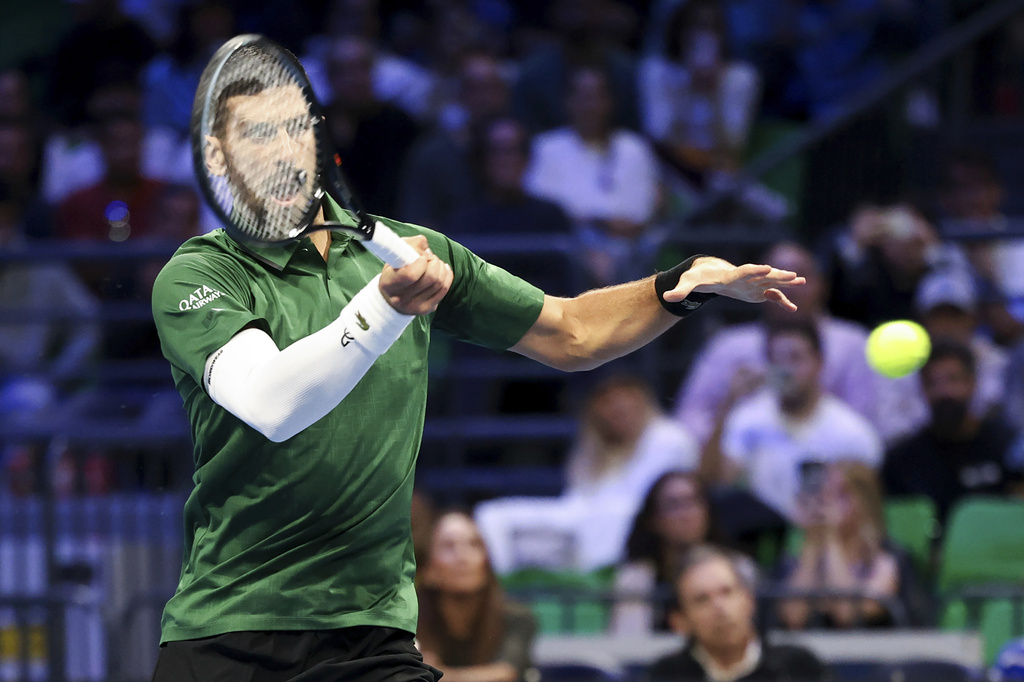 Novak Djokovic of Serbia plays a shot against Lorenzo Musetti of Italy during the ATP 250 tennis tournament final match, in Athens, Greece, Saturday, Nov. 8, 2025. (AP Photo/Yorgos Karahalis)