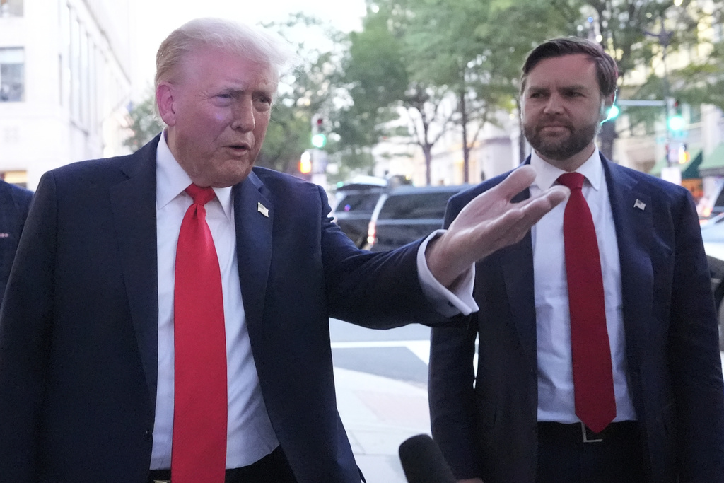 President Donald Trump speaks to reporters before he enters a restaurant near the White House, Tuesday, Sept. 9, 2025, in Washington, to have dinner Vice President JD Vance. (AP Photo/Alex Brandon)