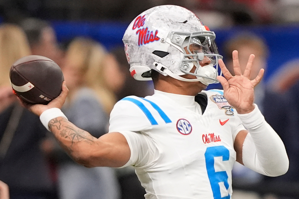 Mississippi quarterback Trinidad Chambliss (6) warms up before the Sugar Bowl NCAA college football playoff quarterfinal game between Georgia and Mississippi, Thursday, Jan. 1, 2026, in New Orleans. (AP Photo/Gerald Herbert)