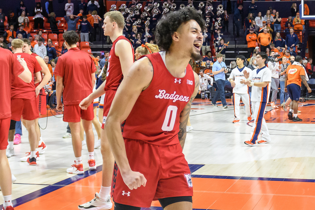 Wisconsin's Braeden Carrington celebrates an overtime win over Illinois after an NCAA college basketball game Tuesday, Feb. 10, 2026, in Champaign, Ill. (AP Photo/Craig Pessman)