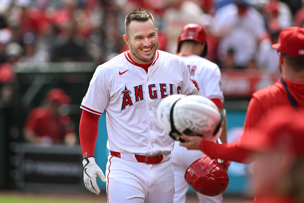 Los Angeles Angels' Mike Trout celebrates after his solo home run against the Houston Astros during the first inning of a baseball game Sunday, Sept. 28, 2025, in Anaheim, Calif. (AP Photo/Wally Skalij)