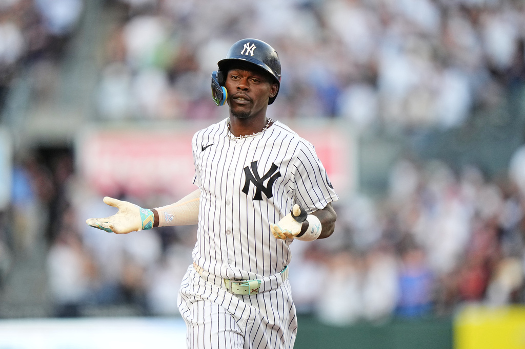 New York Yankees' Jazz Chisholm Jr. gestures as he runs the bases after hitting a home run during the second inning of a baseball game against the St. Louis Cardinals Tuesday, Aug. 4, 2026, in New York. (AP Photo/Frank Franklin II)