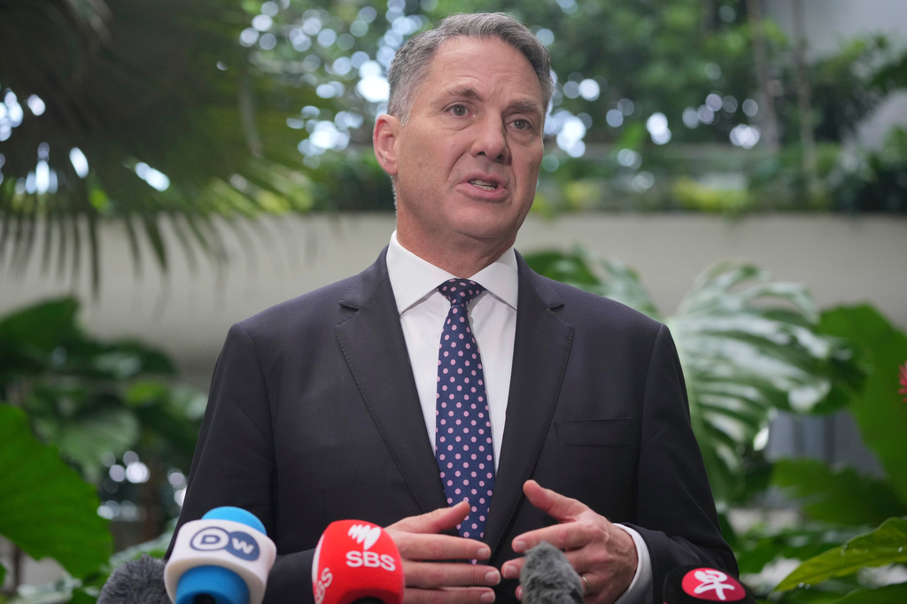 Australian Defense Minister Richard Marles talks to journalists during the Shangri-La Dialogue, Asia's annual defense and security forum, in Singapore, Sunday, May 31, 2026. (AP Photo/Achmad Ibrahim)