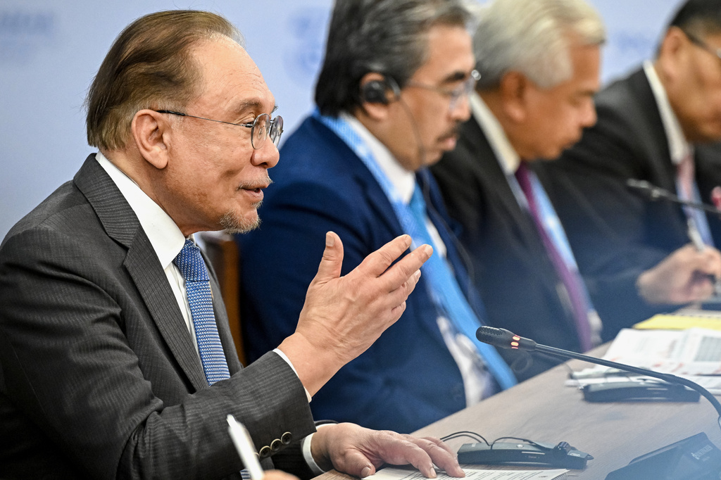 Malaysian Prime Minister Anwar Ibrahim gestures during a meeting with Russian President Vladimir Putin on the sidelines of the Russia-ASEAN summit in Kazan, Russia, Wednesday, June 17, 2026. (Sergei Bobylev/Sputnik, Kremlin Pool Photo via AP)