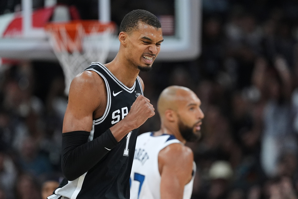 San Antonio Spurs forward Victor Wembanyama (1) reacts to a play against the Minnesota Timberwolves during the second half of Game 5 of an NBA basketball second-round playoffs series in Minneapolis, Tuesday, May 12, 2026. (AP Photo/Eric Gay)