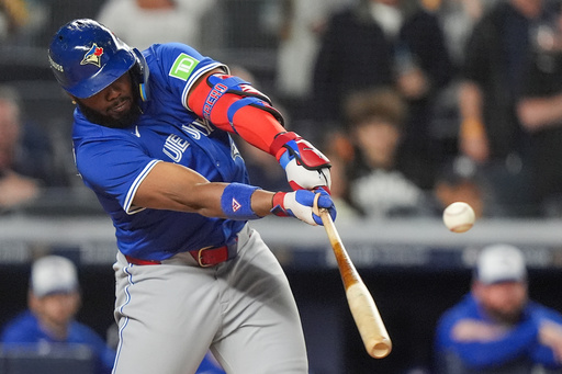 Toronto Blue Jays' Vladimir Guerrero Jr. connects for a single to drive in a run against the New York Yankees during the first inning of Game 4 of baseball's American League Division Series, Wednesday, Oct. 8, 2025, in New York. (AP Photo/Frank Franklin II) Toronto Blue Jays' Vladimir Guerrero Jr. connects for a single to drive in a run against the New York Yankees during the first inning of Game 4 of baseball's American League Division Series, Wednesday, Oct. 8, 2025, in New York. (AP Photo/Frank Franklin II)