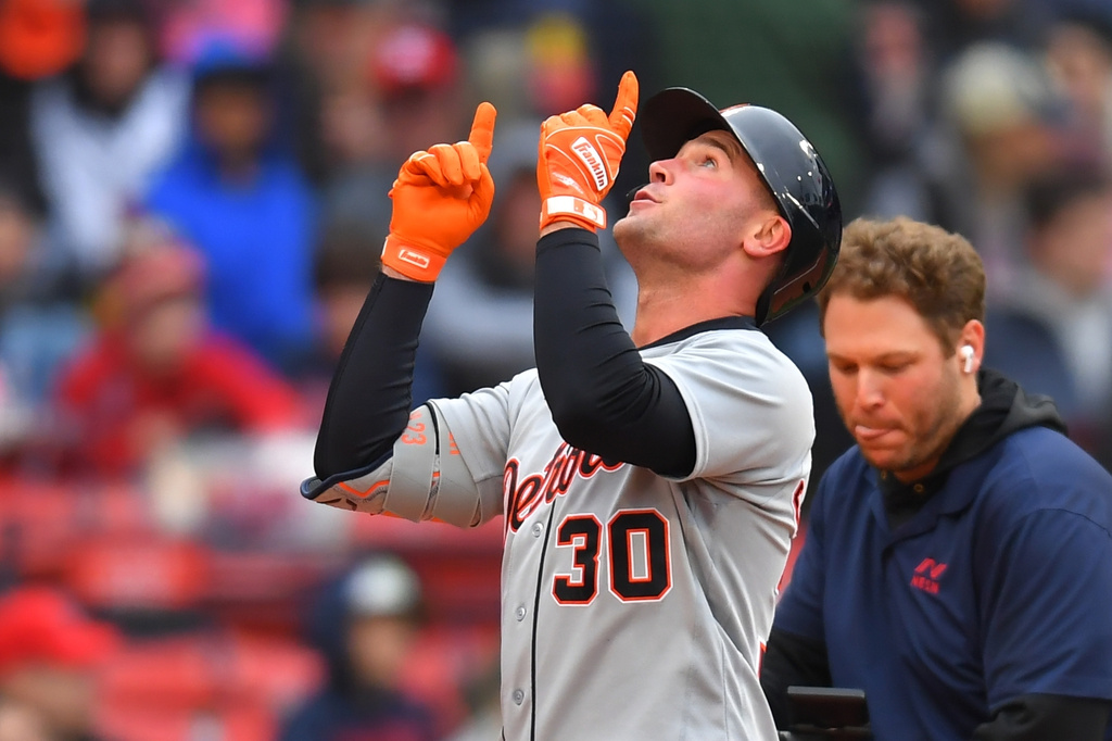 Detroit Tigers' Kerry Carpenter (30) celebrates after his home run as he arrives at home plate in the fourth inning of a baseball game against the Boston Red Sox, Saturday, April 18, 2026, in Boston. (AP Photo/Steven Senne)