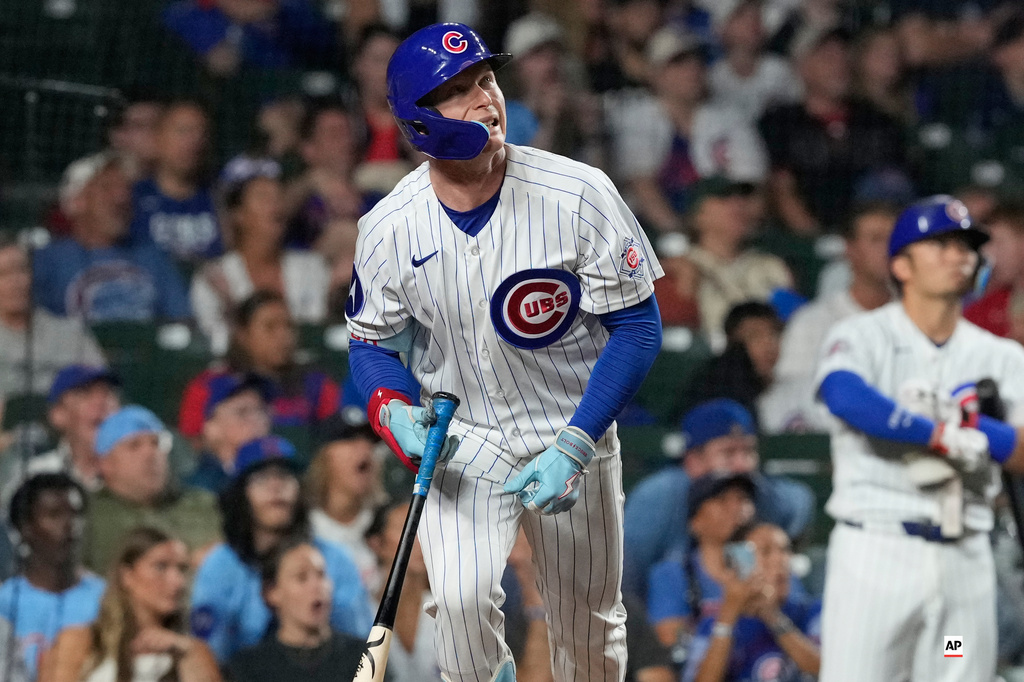 Chicago Cubs' Pete Crow-Armstrong watches his solo home run during the ninth inning of a baseball game against the Cincinnati Reds in Chicago, Sunday, Aug. 30, 2026. (AP Photo/Nam Y. Huh)