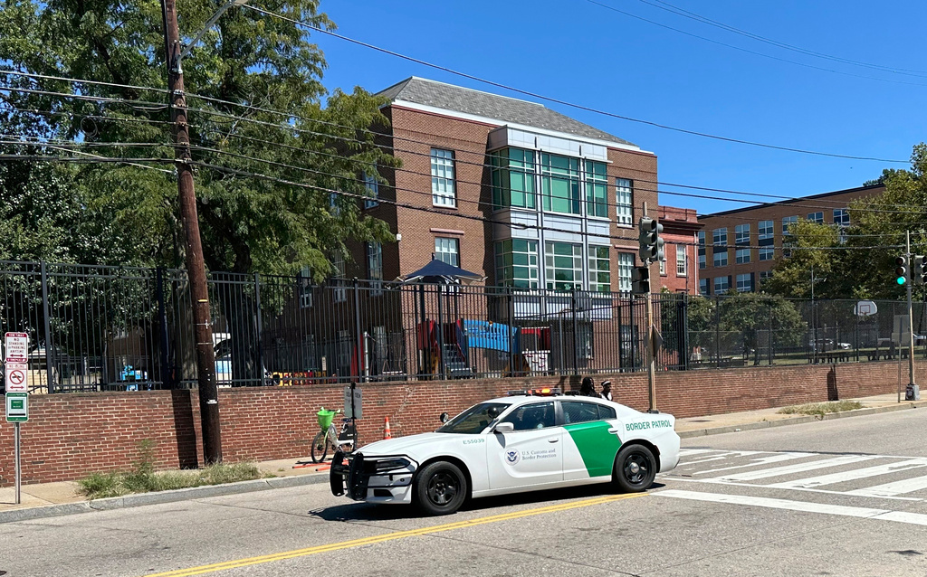 The Border Patrol pulls out of the metro station in the Anacostia neighborhood of Washington, Aug. 30, 2025. (AP Photo/Gary Fields)