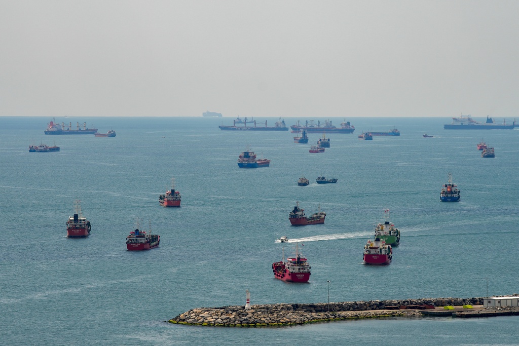 FILE - Cargo ships are anchored in the Sea of Marmara as they await to cross the Bosphorus, in Istanbul, Turkey, April 13, 2025. (AP Photo/Emrah Gurel, File)