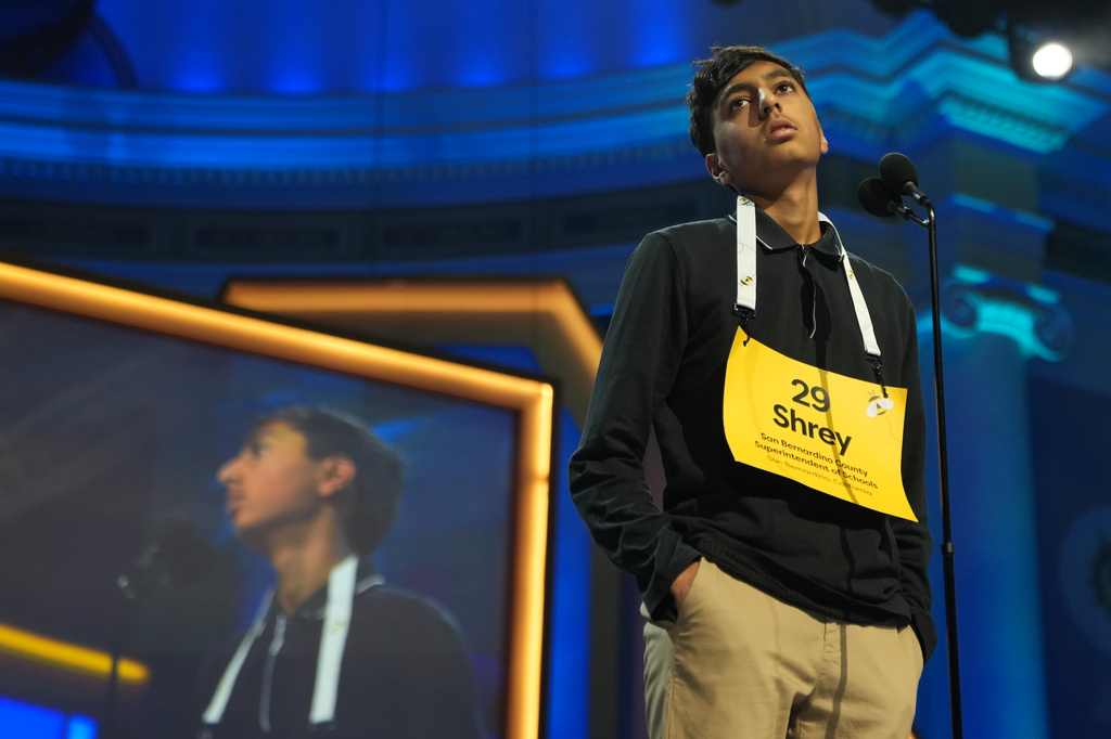 Shrey Parikh, 14, of Rancho Cucamonga, Calif., considers a question during the final round of the 2026 Scripps National Spelling Bee in Washington, Thursday, May 28, 2026. (AP Photo/Allison Robbert)
