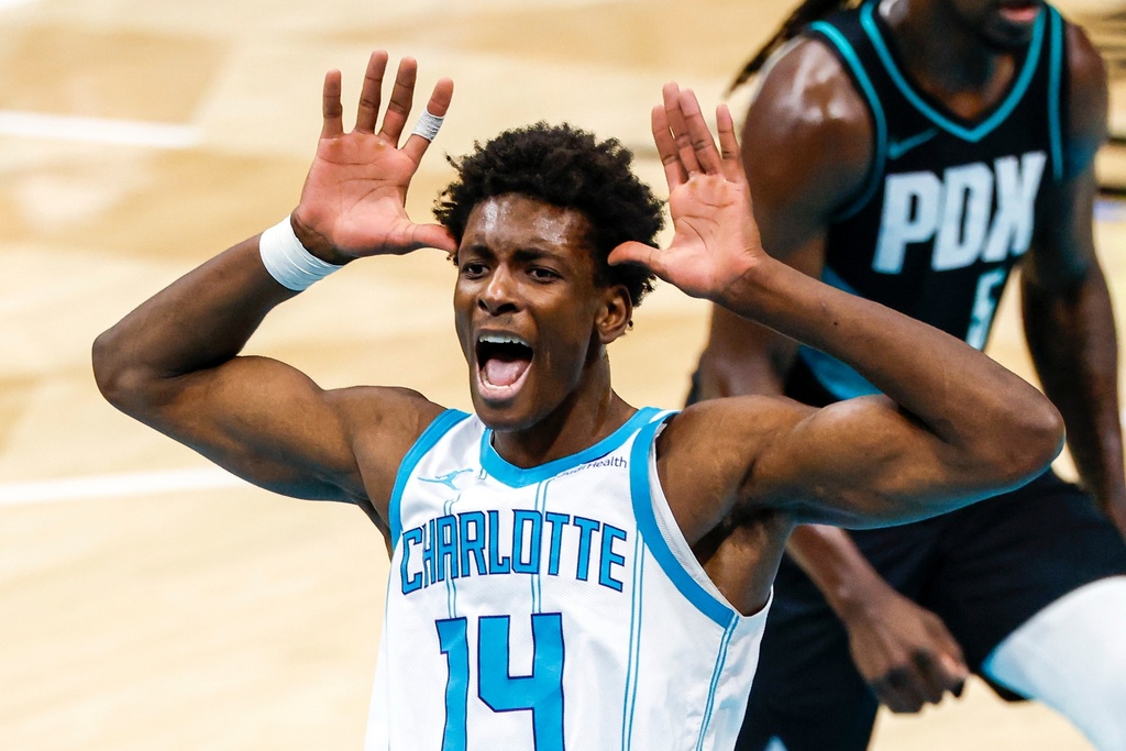 Charlotte Hornets forward Moussa Diabate celebrates after dunking against the Portland Trail Blazers during the second half of an NBA basketball game in Charlotte, N.C., Saturday, Feb. 28, 2026. (AP Photo/Nell Redmond)