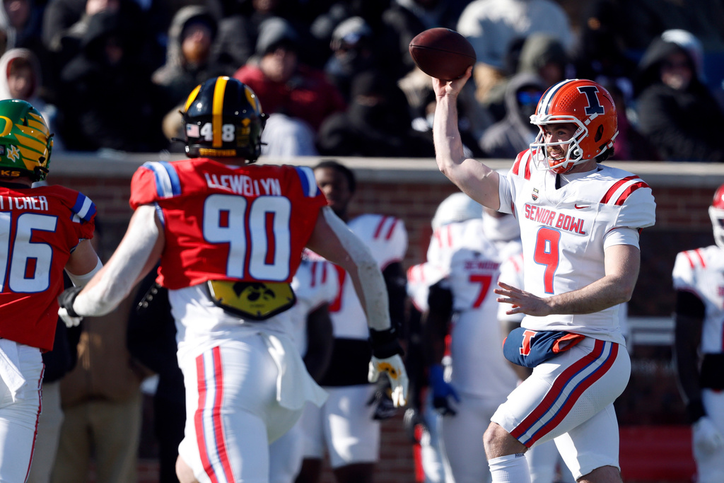 American Team quarterback Luke Altmyer (9), of Illinois, throws a pass during the first half of the Senior Bowl NCAA college football game Saturday, Jan. 31, 2026, in Mobile, Ala. (AP Photo/Butch Dill)