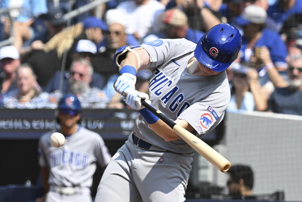Chicago Cubs' Owen Caissie (19), making his major league debut, flies out against the Toronto Blue Jays during a baseball game, Thursday, Aug. 14, 2025, in Toronto. (Jon Blacker/The Canadian Press via AP)