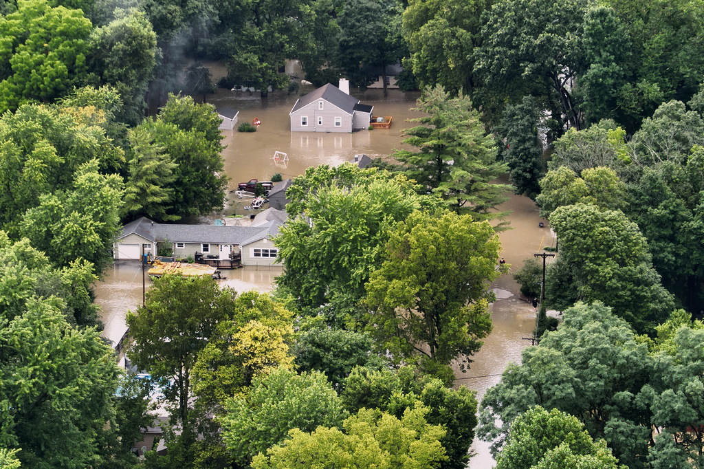 This aerial photo provided by the Indianapolis Fire Department shows flooding in northern Indianapolis, Ind., Saturday, Aug. 15, 2026. (Indianapolis Fire Department via AP)