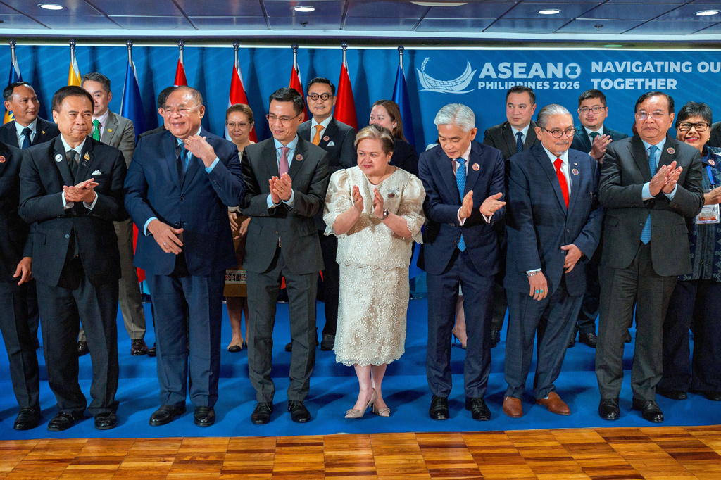Front row, from left, Thailand Deputy Prime Minister and Foreign Minister Sihasak Phuangketkeow, Timor-Leste Foreign Minister Bendito dos Santos Freitas, Vietnam Deputy Foreign Minister Dang Hoang Giang, Philippines Foreign Secretary Theresa Lazaro, Singapore Permanent Secretary of Foreign Affairs Albert Chua, Brunei Foreign Minister Erywan Yusof, Cambodia Deputy Prime Minister and Foreign Minister Prak Sokhonn, and Indonesia Director General for ASEAN Cooperation Ina Hagniningtyas Krisnamurthi clap after posing for a photo with representatives from the ASEAN Intergovernmental Commission on Human Rights (AICHR) Representatives during the ASEAN Foreign Ministers' Meeting at the Philippine International Convention Center, Monday July 20, 2026 in Pasay, Metro Manila, Philippines. (Ezra Acayan/Pool Photo via AP)