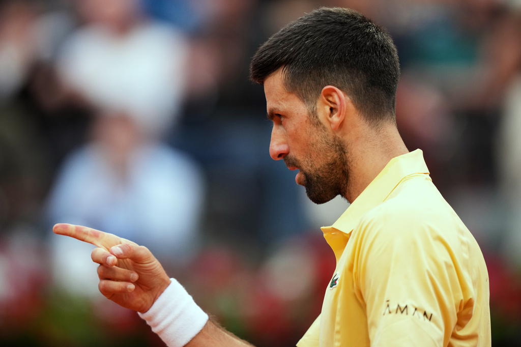Serbia's Novak Djokovic reacts after winning point to Croatia's Dino Prizmic during their match at the Italian Open tennis tournament, in Rome, Friday, May 8, 2026. (AP Photo/Andrew Medichini)