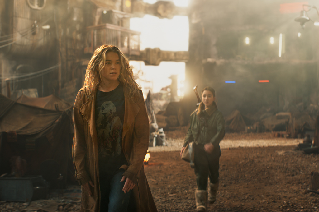 This image released by Warner Bros. Pictures shows Milly Alcock, left, and Eve Ridley in a scene from "Supergirl." (Warner Bros. Pictures via AP)