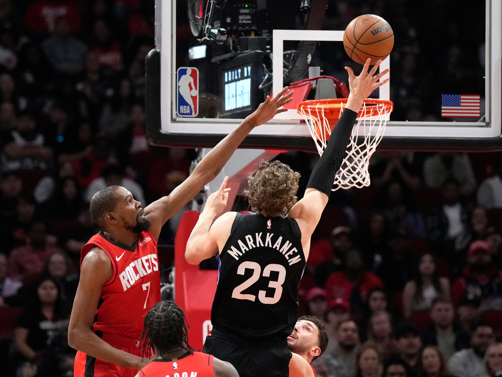 Houston Rockets forward Kevin Durant (7) defends against Utah Jazz forward Lauri Markkanen (23) during the first half of an NBA basketball game, Monday, Feb. 23, 2026, in Houston. (AP Photo/Karen Warren)