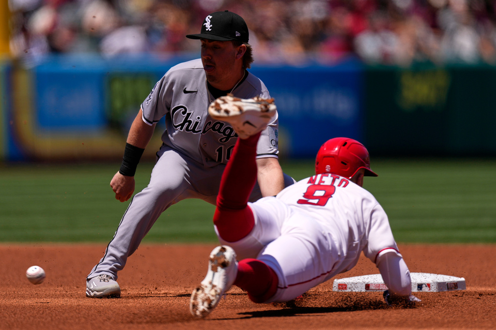 Los Angeles Angels' Zach Neto, right, tries to steal second as Chicago White Sox second baseman Chase Meidroth waits for the ball before tagging him out during the first inning of a baseball game Wednesday, May 6, 2026, in Anaheim, Calif. (AP Photo/Mark J. Terrill)