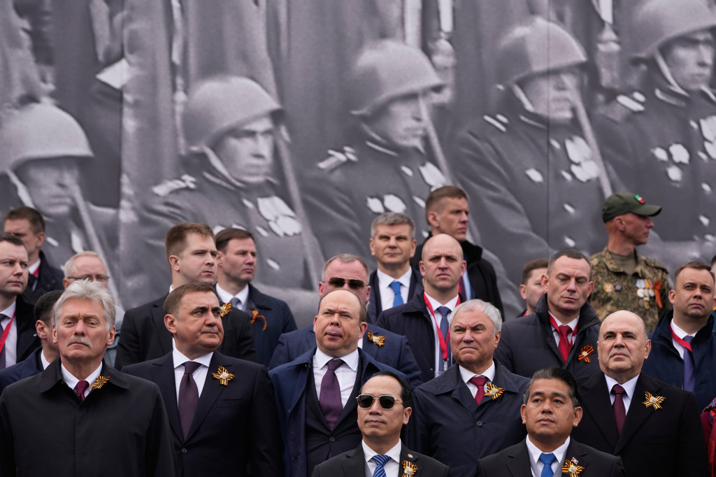 From left, Kremlin spokesman Dmitry Peskov, Russian Presidential Aide Alexei Dyumin, Chief of Staff of the Presidential Executive Office Anton Vaino, Russian State Duma Chairman Vyacheslav Volodin and Russian Prime Minister Mikhail Mishustin attend the Victory Day military parade in Moscow, Saturday, May 9, 2026, during celebrations of the 81st anniversary of the Soviet Union's victory over Nazi Germany during the World War II. (AP Photo/Pavel Bednyakov, Pool)