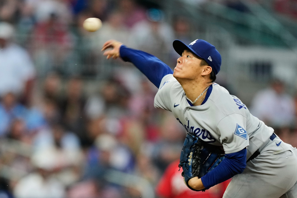 Los Angeles Dodgers' Yoshinobu Yamamoto throws to the Atlanta Braves during the third inning in Game 3 of baseball's National League Division Series, Tuesday, Oct. 6, 2026, in Atlanta. (AP Photo/Brynn Anderson)