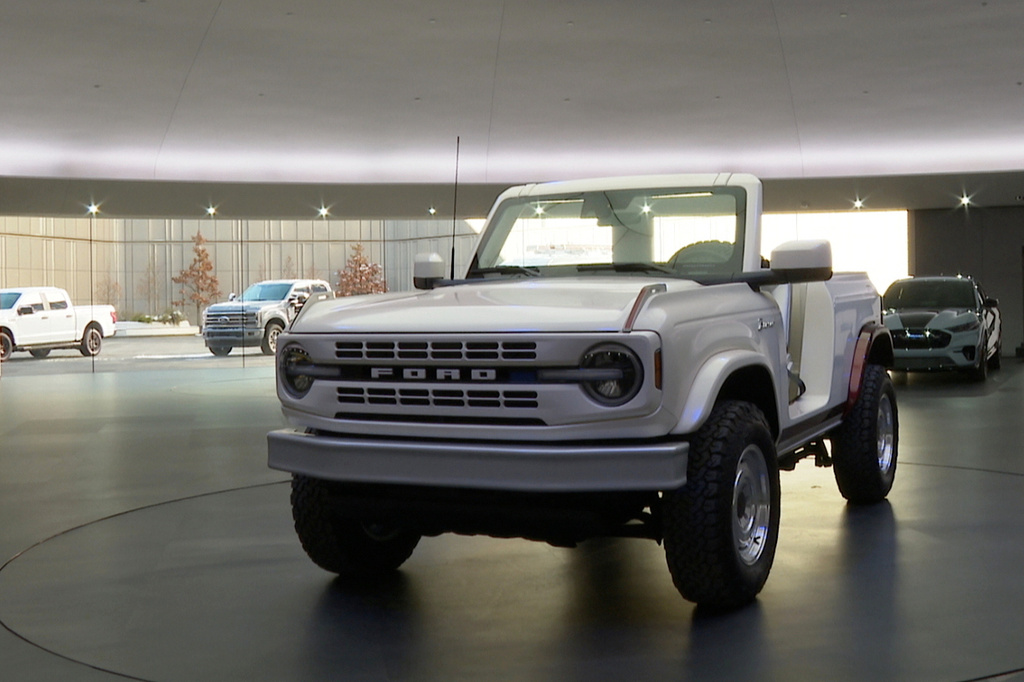 In this image taken from video, a Bronco concept vehicle is parked in the showroom inside Ford Motor Co.'s new headquarters building, Monday, Nov. 10, 2025, in Dearborn, Mich. (AP Photo/Mike Householder)