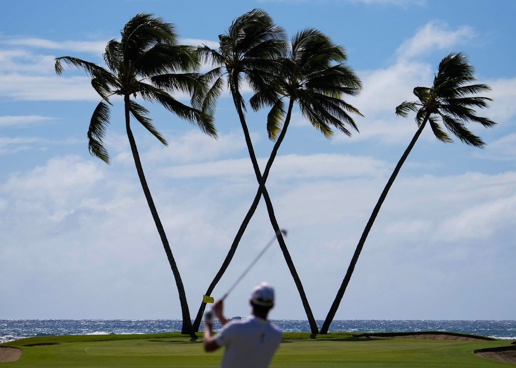 Andrew Putnam hits on the 16th hole during the final round of the Sony Open golf event, Jan. 12, 2025, at Waialae Country Club in Honolulu. (AP Photo/Matt York, File)