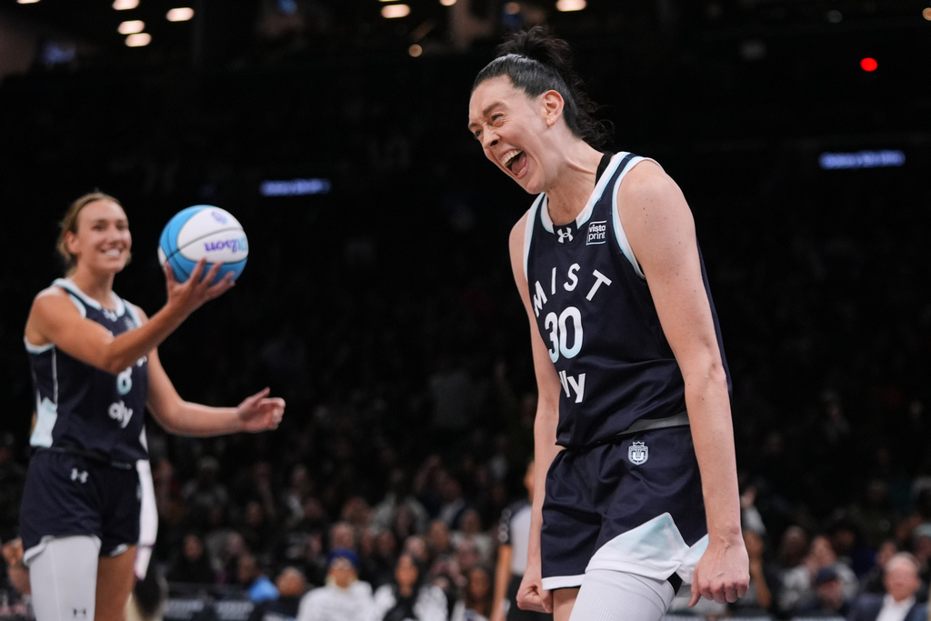 Mist BC wing Breanna Stewart (30) celebrates with teammate Alanna Smith (8) after scoring during the second half of a semifinal in an Unrivaled 3-on-3 basketball game against Breeze BC, Monday, March 2, 2026, in New York. (AP Photo/Frank Franklin II)