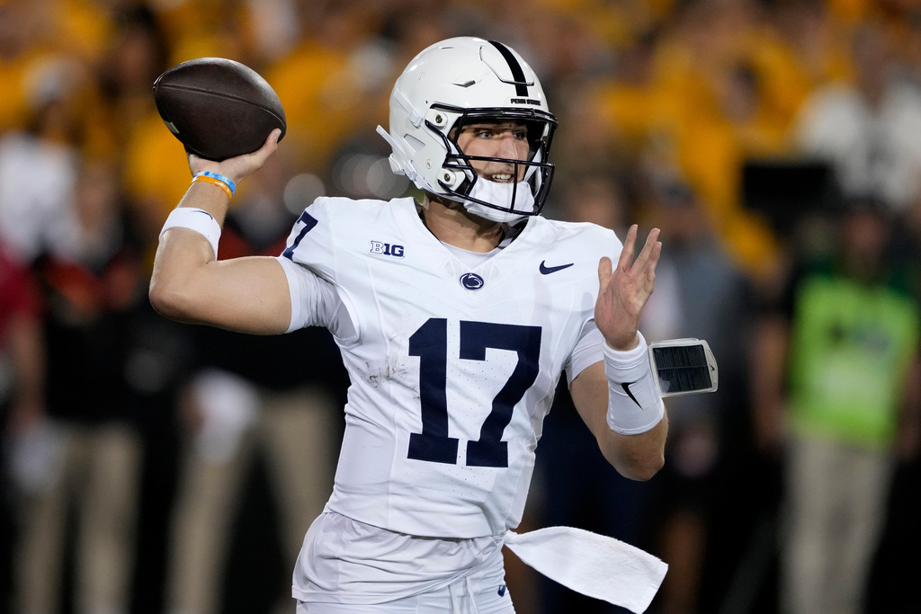 Penn State quarterback Ethan Grunkemeyer throws a pass during the first half of an NCAA college football game against Iowa, Saturday, Oct. 18, 2025, in Iowa City, Iowa. (AP Photo/Charlie Neibergall)