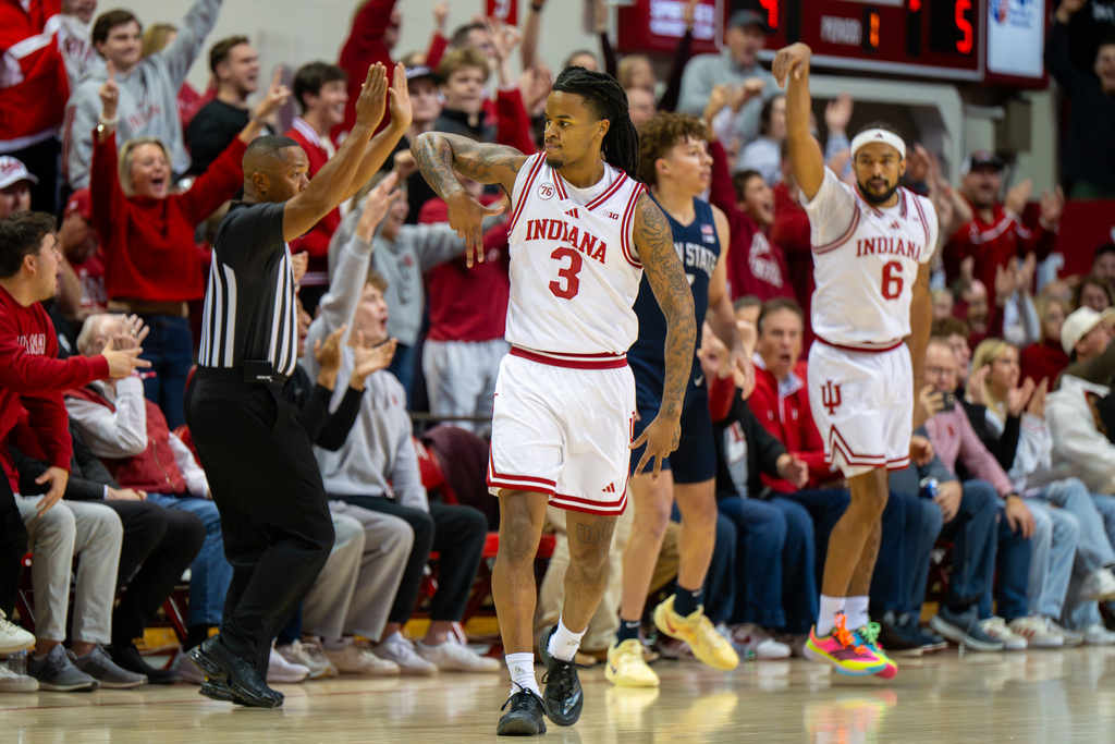Indiana guard Lamar Wilkerson (3) reacts after scoring during the first half of an NCAA college basketball game against Penn State, Tuesday, Dec. 9, 2025, in Bloomington, Ind. (AP Photo/Doug McSchooler)