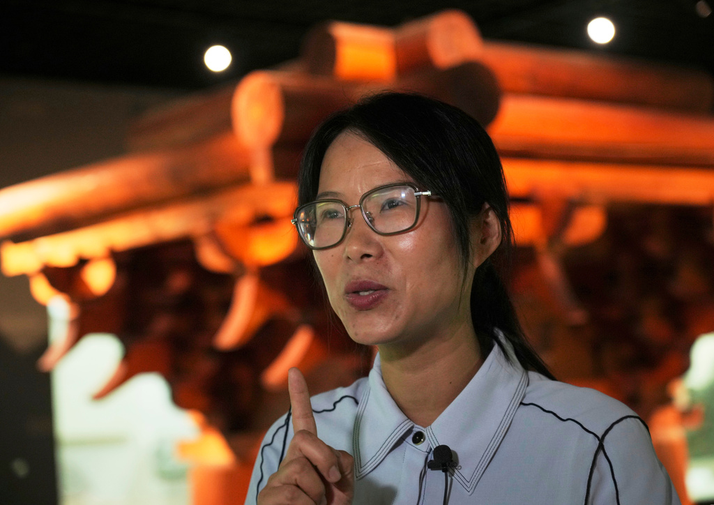 Cai Hongping speaks to a reporter as she visits the Wudang Museum in central China's Hubei Province on Sept, 4, 2026. (AP Photo/Achmad Ibrahim)