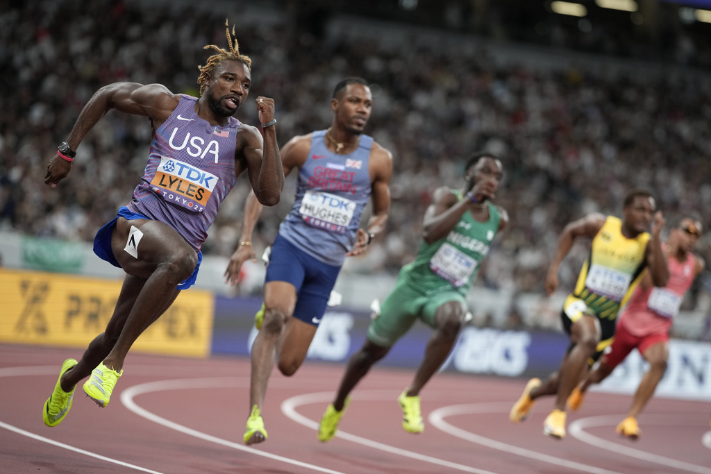 United States' Noah Lyles competes in the men's 200 meters heats at the World Athletics Championships in Tokyo, Thursday, Sept. 18, 2025. (AP Photo/Louise Delmotte)