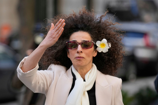 FILE - Masih Alinejad blows a kiss to supporters outside the federal courthouse after testifying at the trial of her would-be assassins in New York, March 18, 2025. (AP Photo/Seth Wenig, File) FILE - Masih Alinejad blows a kiss to supporters outside the federal courthouse after testifying at the trial of her would-be assassins in New York, March 18, 2025. (AP Photo/Seth Wenig, File)
