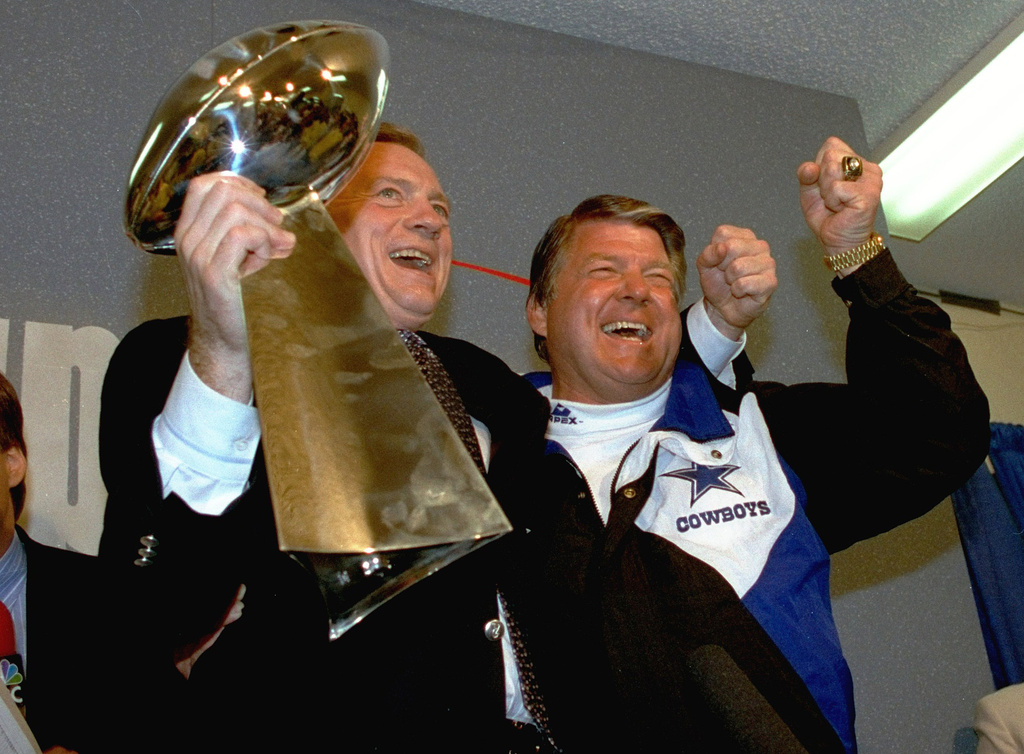 FILE - In this Jan. 31, 1993 file photo, Dallas Cowboys head coach Jimmy Johnson, right, and owner Jerry Jones, hold up the Vince Lombardi Trophy as they celebrate their 52-17 win over the Buffalo Bills in Super Bowl XXVII in Pasadena, Calif. (AP Photo/Rick Bowmer, File)