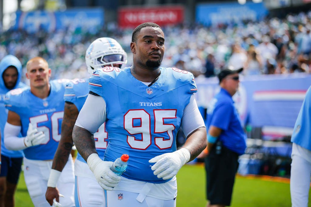 FILE - Tennessee Titans defensive lineman Jordan Elliott (95) walks to the locker room at halftime of an NFL football game against the Philadelphia Eagles in Nashville, Tenn., Sept. 20, 2026. (AP Photo/Stew Milne, File)