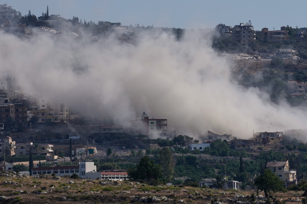 Smoke rises as Israeli forces demolish homes in Mansouri village, southern Lebanon, Thursday, Sept. 3, 2026. (AP Photo/Mohammed Zaatari)