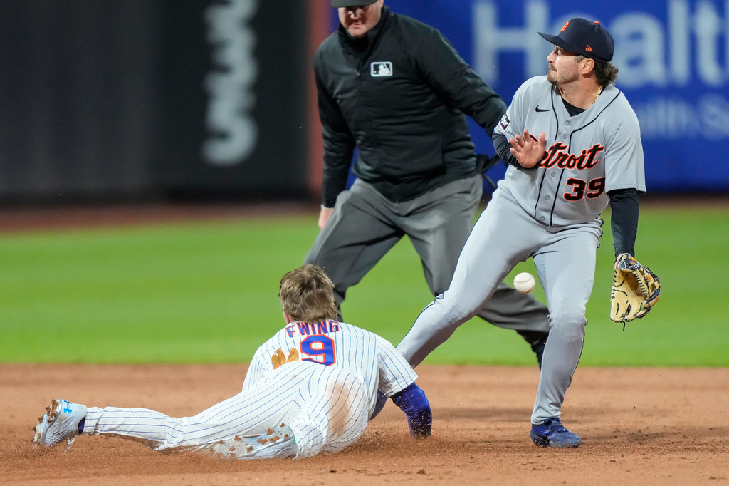 New York Mets' A.J. Ewing (9) successfully steals second base during the sixth inning of a baseball game against the Detroit Tigers, Tuesday, May 12, 2026, in New York. (AP Photo/Yuki Iwamura)