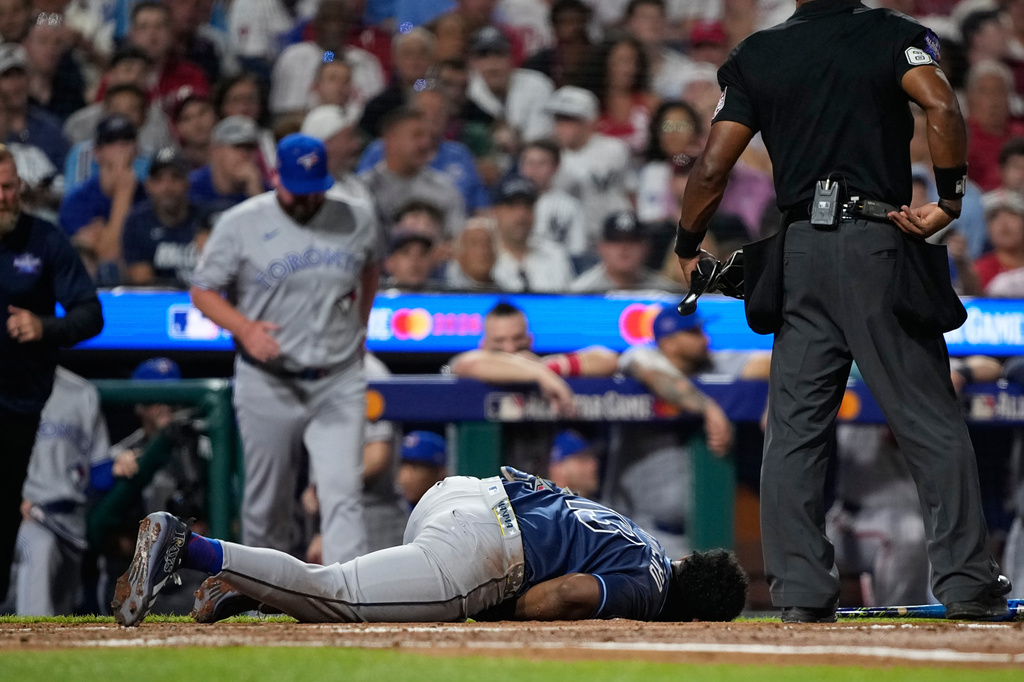 Tampa Bay Rays' Junior Caminero reacts after being hit by a pitch by St. Louis Cardinals' Riley O'Brien in the third inning of the MLB baseball All-Star Game between the American League and National League, Tuesday, July 14, 2026, in Philadelphia. (AP Photo/Matt Slocum)