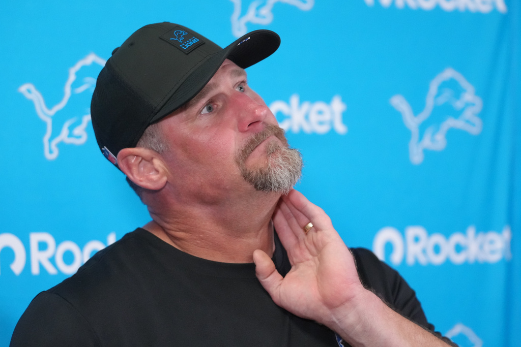 Detroit Lions head coach Dan Campbell pauses during a news conference following an NFL football game against the Kansas City Chiefs Sunday, Oct. 12, 2025, in Kansas City, Mo. (AP Photo/Ed Zurga)
