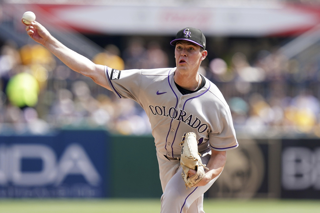 Colorado Rockies pitcher McCade Brown delivers during the second inning of a baseball game against the Pittsburgh Pirates Sunday, Aug. 24, 2025, in Pittsburgh. (AP Photo/Matt Freed)