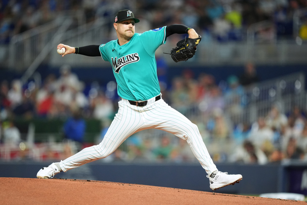Miami Marlins starting pitcher Janson Junk delivers during the first inning of a baseball game against the San Diego Padres, Sunday, July 26, 2026, in Miami. (AP Photo/Rebecca Blackwell)