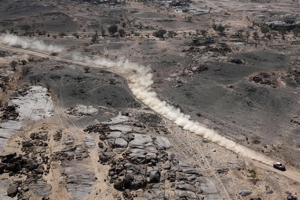 Driver Mathieu Serradori and co-driver Loic Minaudier compete during stage one of the Dakar Rally with start and finish in Bisha, Saudi Arabia, Saturday, Jan. 4, 2025. (AP Photo/Christophe Ena)