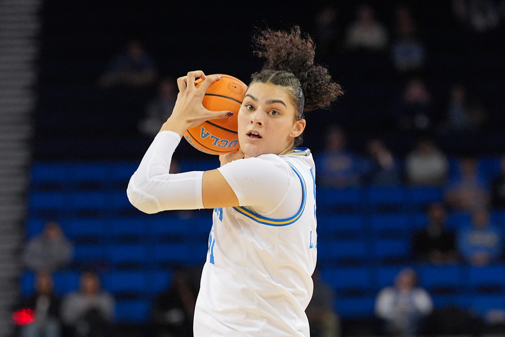 UCLA center Lauren Betts grabs the pass during the second half of an NCAA women's college basketball game against Washington in Los Angeles, Thursday, Feb. 19, 2026. (AP Photo/Jae C. Hong)