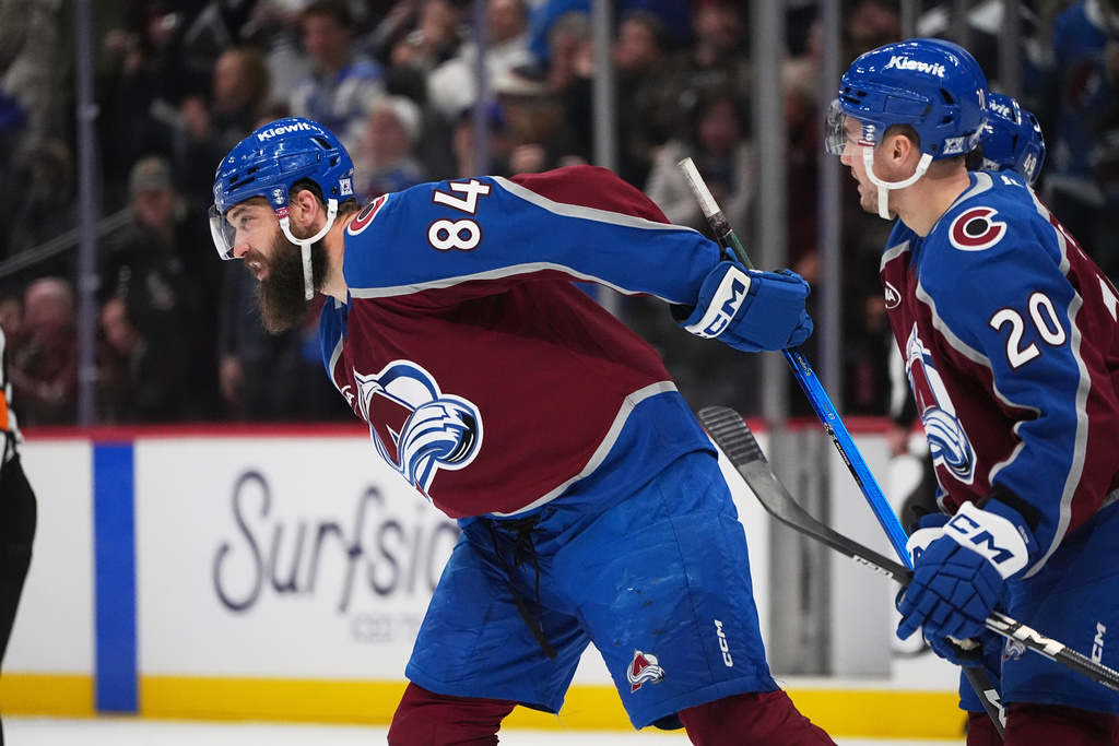 Colorado Avalanche defenseman Brent Burns, left, celebrates after scoring a goal with center Ross Colton in the first period of an NHL hockey game against the Columbus Blue Jackets Saturday, Jan. 10, 2026, in Denver. (AP Photo/David Zalubowski)
