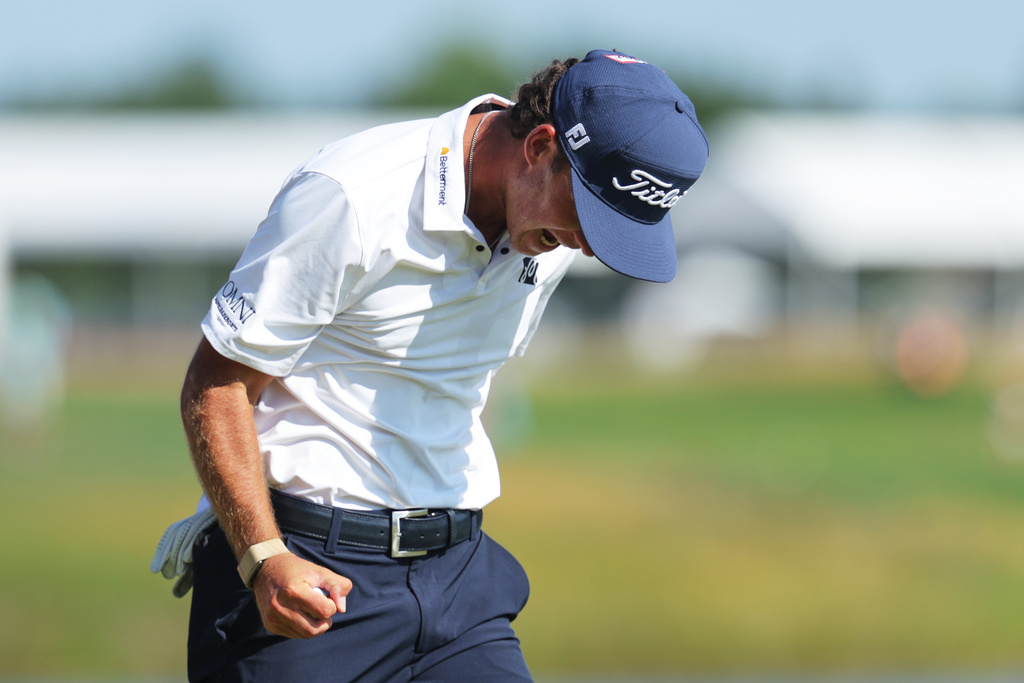Jackson Koivun reacts after winning the 3M Open golf tournament at the Tournament Players Club Sunday, July 26, 2026, in Blaine, Minn. (AP Photo/Bailey Hillesheim)