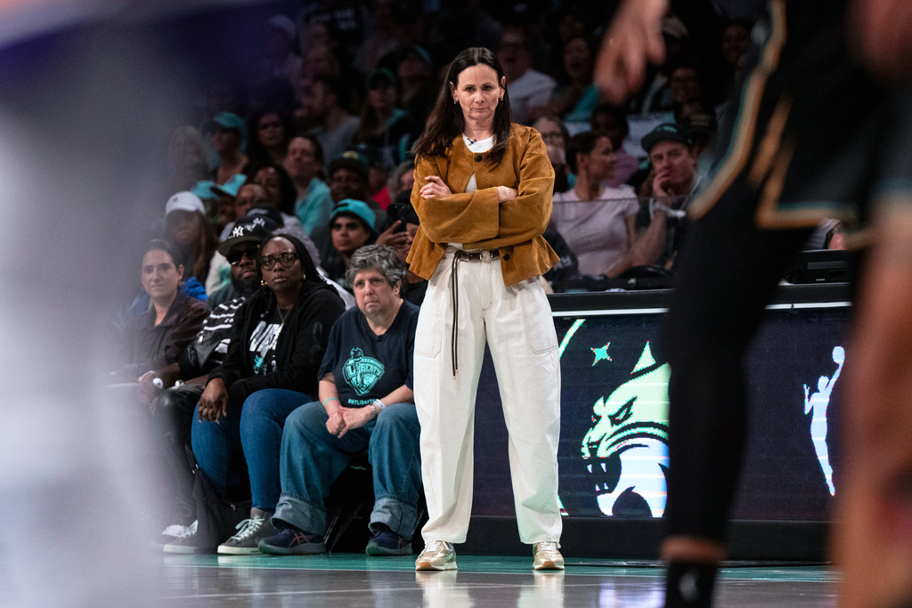 New York Liberty coach Sandy Brondello watches the first half of Game 2 in the first round of the WNBA basketball playoffs against the Phoenix Mercury, Wednesday, Sept. 17, 2025, in New York. (AP Photo/Angelina Katsanis)